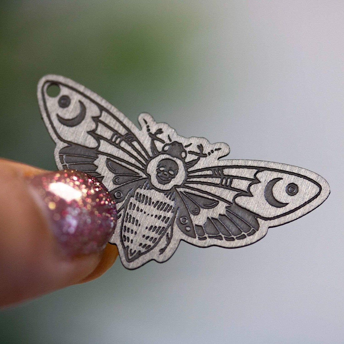 How to create custom engraved metal charm designs